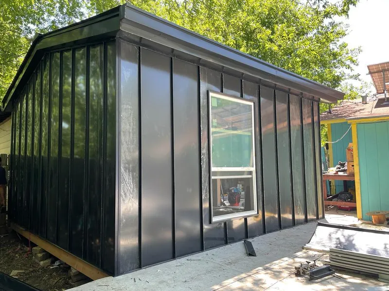 Black standing seam metal wall panels for Roof Inspection in Gardendale