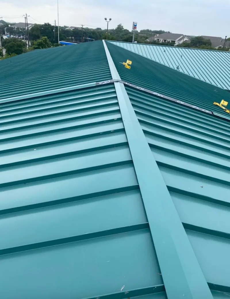 Green commercial metal roof ridge and valley for Metal Roof Repair in Gardendale